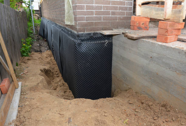SJ Waterproofing Pros technician performing targeted Waterproofing assessment in Cicero, IL